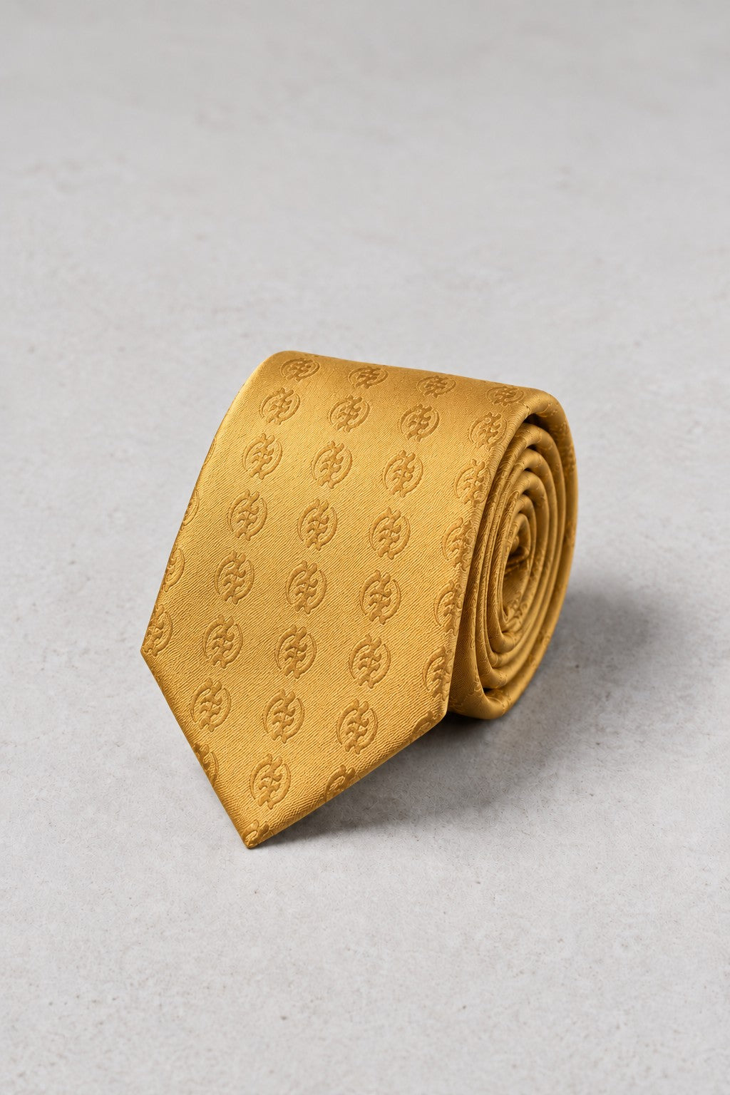 ODEHYE Golden Heritage Tie in 100% woven silk with repeated tonal Gye Nyame motif